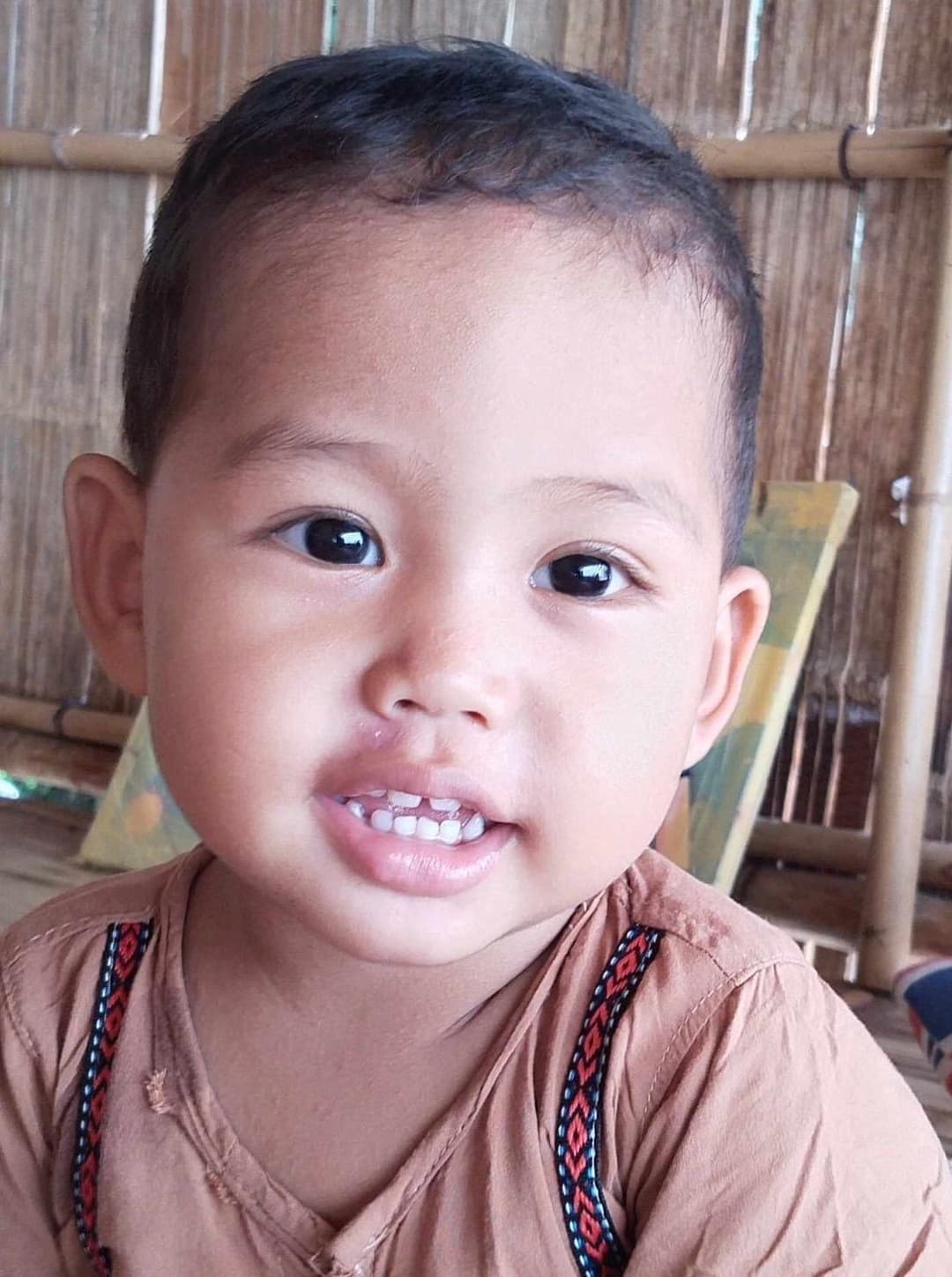 Baby Cinco smiling — healthy and thriving