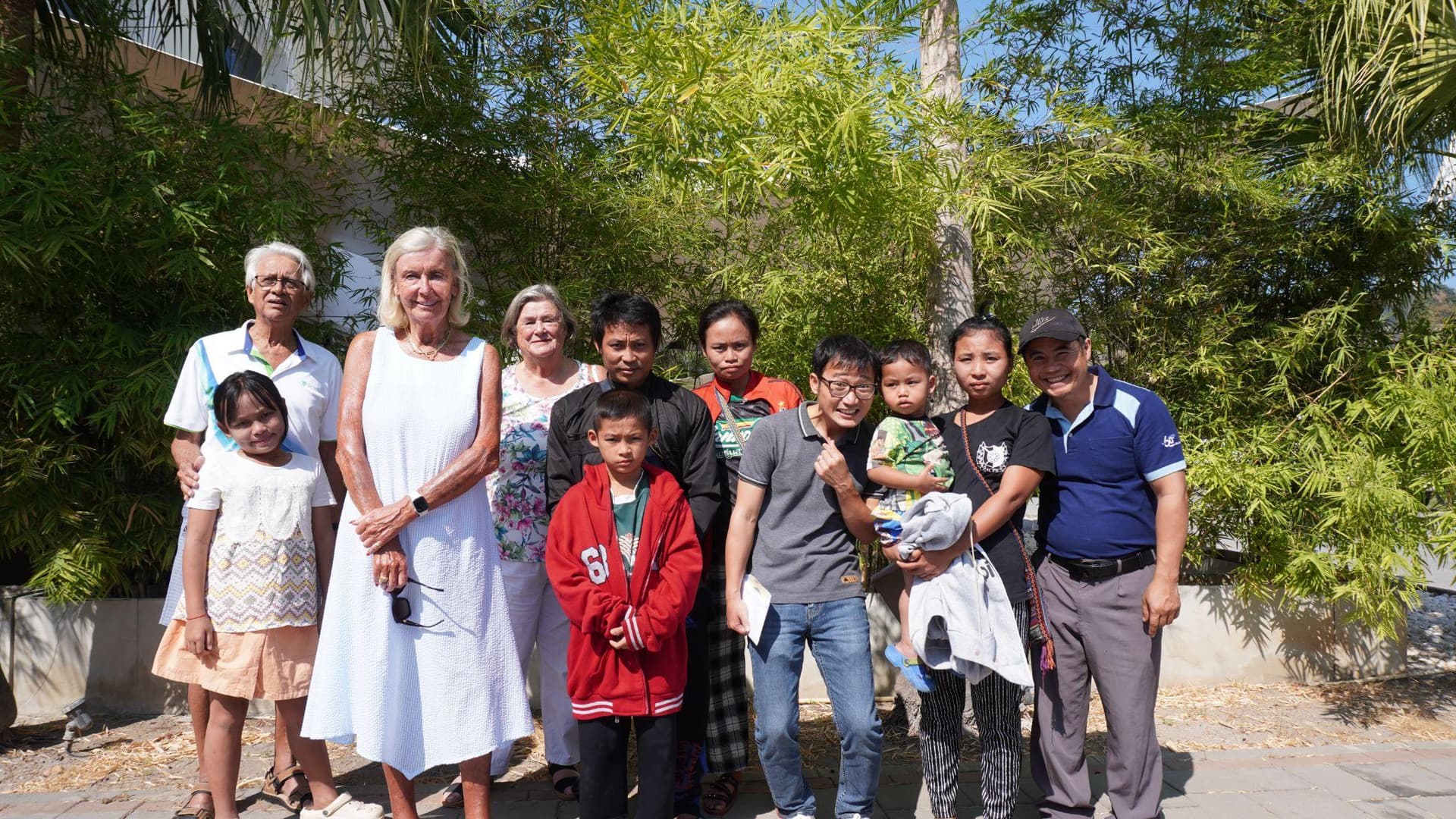 Be Well Child Care Foundation team and children